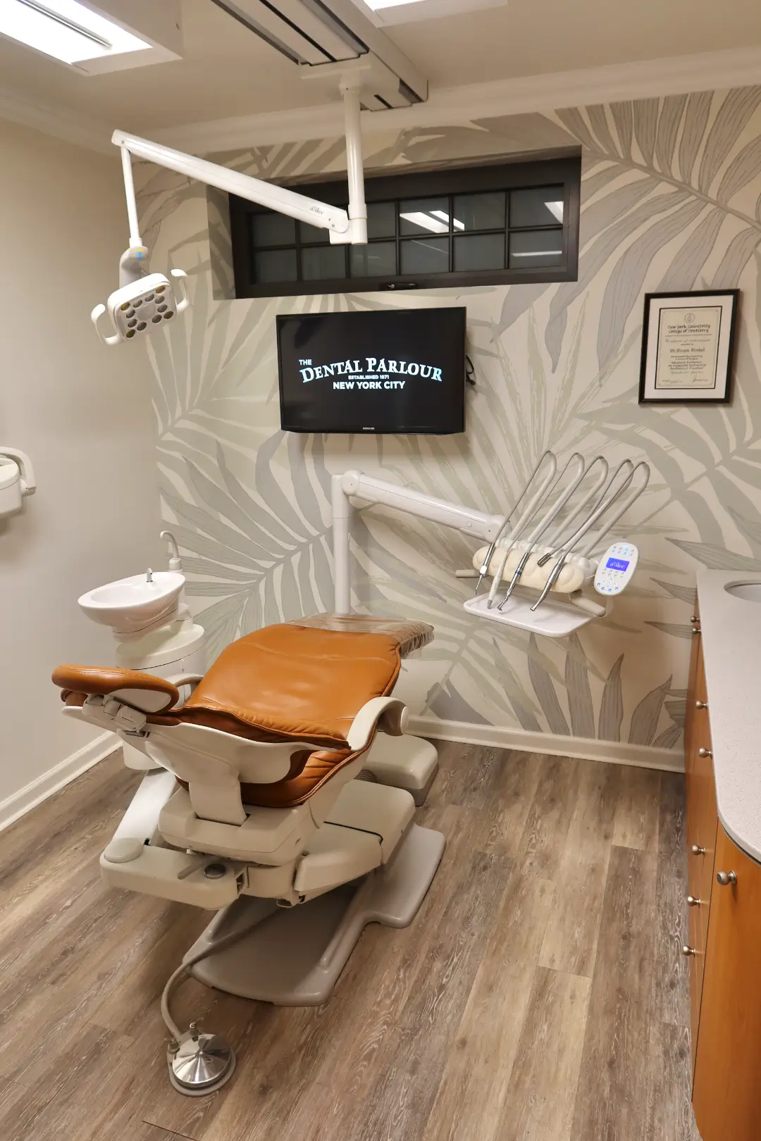 Modern dental operatory room with chair and X-ray equipment at The Dental Parlour